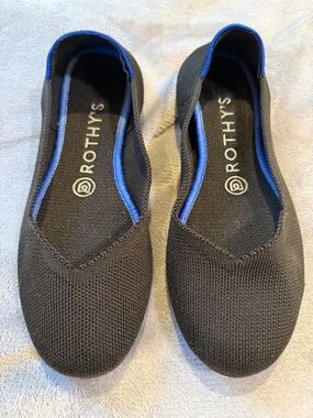 Rothy's Black Knit Slip-Ons with Blue Trim